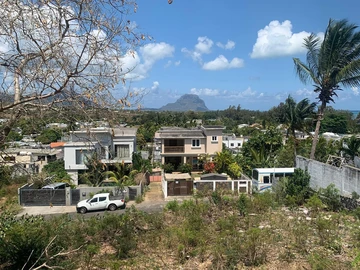 Plot of land at black river in a secure and private development, View of the morne