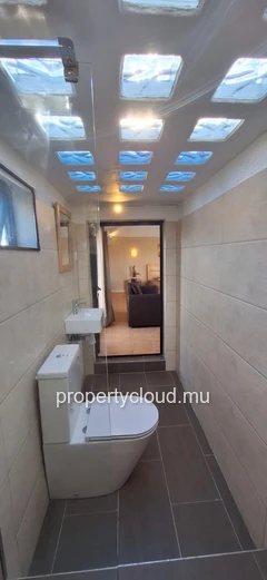 Rooftop Studio with Stunning Lagoon Views for Rent in Calodyne