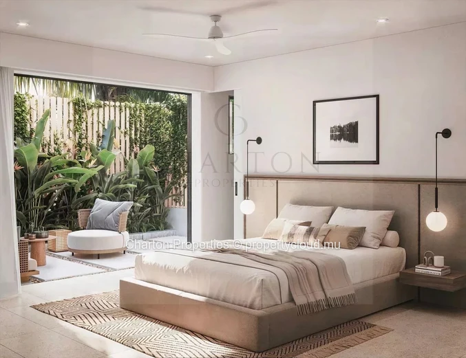 Appartement 1 chambre pieds dans l’eau avec jardin privatif face au lagon