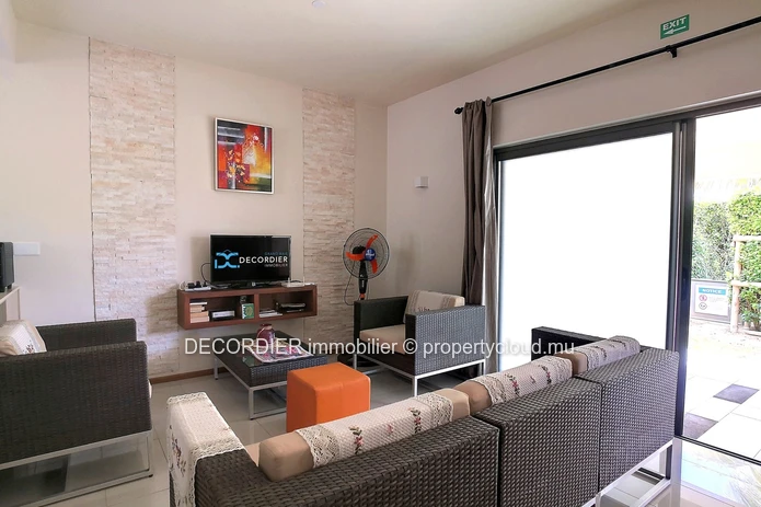 Duplex in residence with communal swimming pool