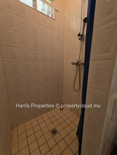 Beachfront house for sale in a secure residence in Calodyne