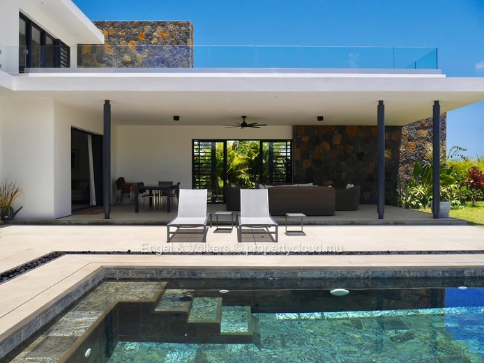 Exceptional Villa Bridging Ocean Luxury and Golfside Tranquility