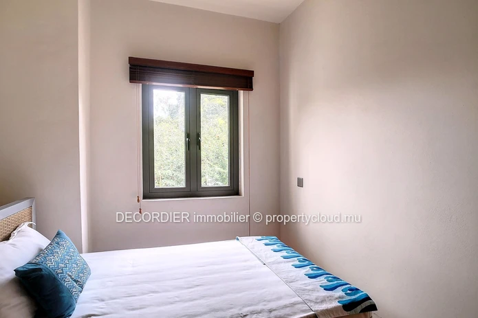 Duplex in residence with communal swimming pool