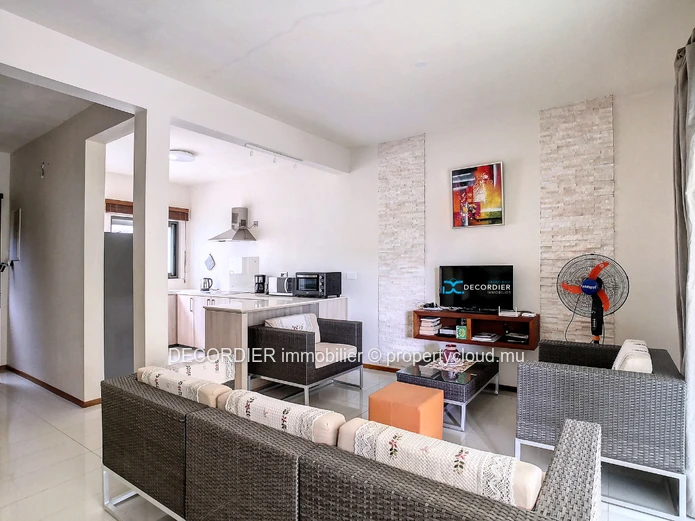 Duplex in residence with communal swimming pool