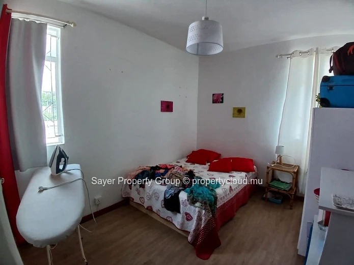 Rare Opportunity: Spacious Top Floor Apartment with Ocean Views