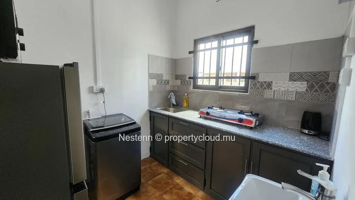 Modern furnished apartment in Beau Bassin 2 bedrooms 1 bathroom good condition ground floor close to shops and bus stop
