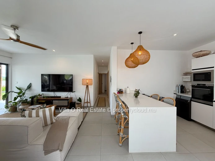 So lovely, this charming home stands out for its exquisite interior design, its lovely landscaped garden, and its Bom...
