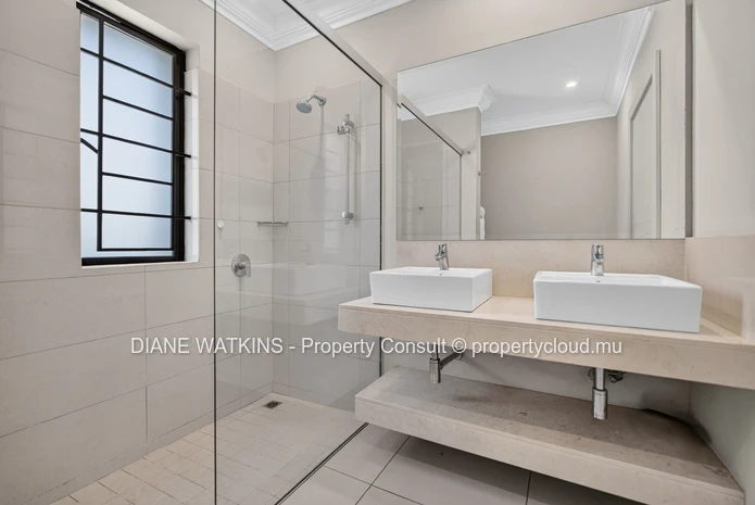 Beachfront Penthouse for Sale in Tamarin | 3 Bedrooms, Private Rooftop Terrace & Ocean Views