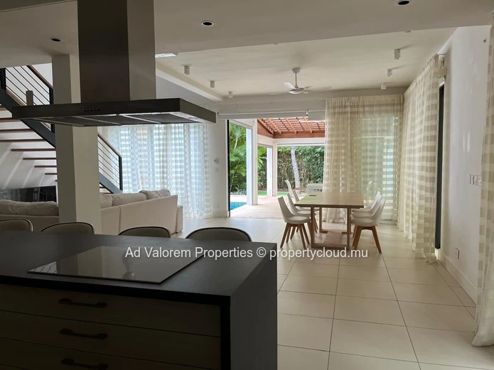 Exceptional corner apartment with private garden and heated swimming pool!