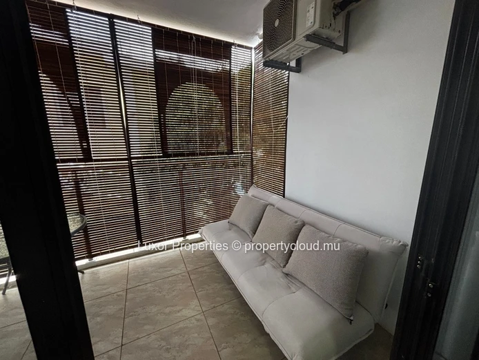 2-Bedroom Apartment in Flic en Flac | Rooftop Sea Views | Pool & Party Area 