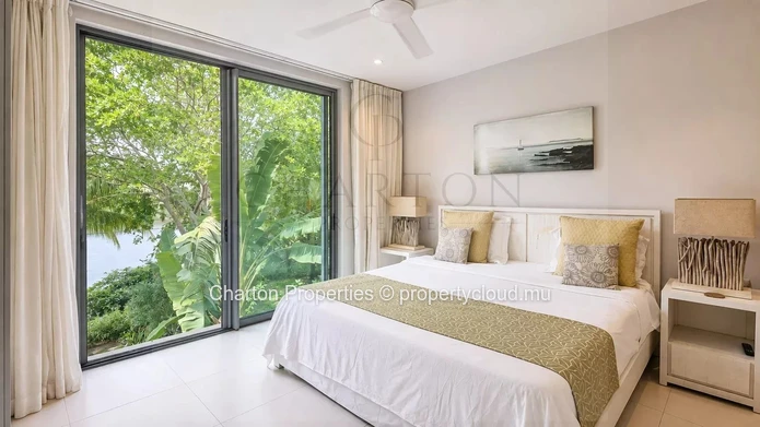 Appartement contemporain de 3 chambres avec vue sur la rivière et le lagon