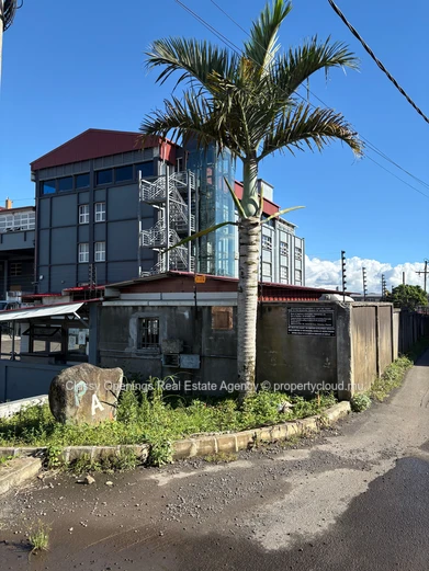 Prime 4,200m² Commercial Plot in Petit Camp — Mountain Views & Near Bus