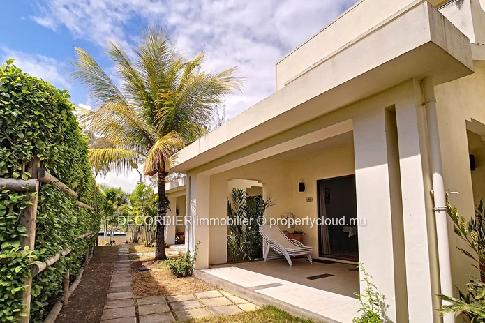 Duplex in residence with communal swimming pool