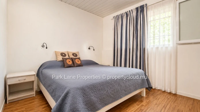 New 2-bedroom ground-floor apartment with communal pool in Beau Plan