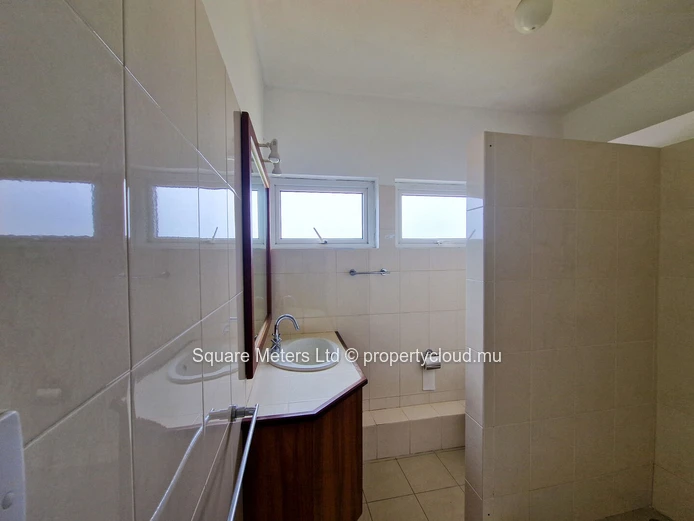 Live in the Heart of Curepipe – 3-Bedroom Apartment with Lift & Covered Garage (Sole Mandate)