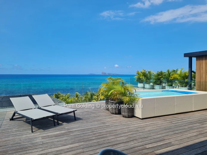 3-Bedroom Penthouse for Sale in Pointe aux Canonniers. Contemporary Design, Sea Views & Rooftop Pool