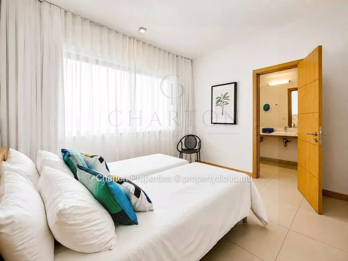 Elegant 3-bedroom apartment with en-suite bathrooms, a terrace, and exclusive amenities in Grand Gaube