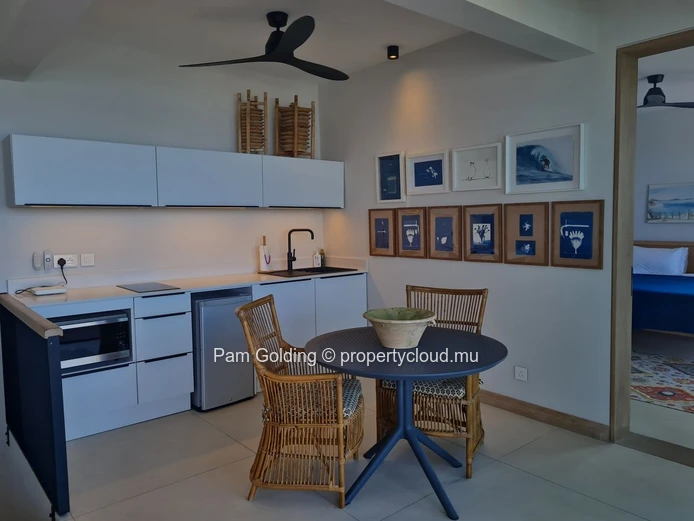 3-Bedroom Penthouse for Sale in Pointe aux Canonniers. Contemporary Design, Sea Views & Rooftop Pool