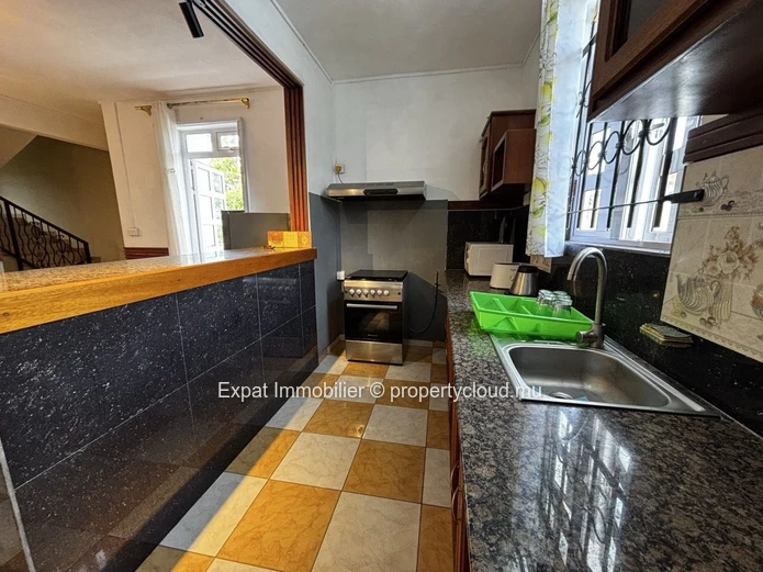 2-Bedroom Apartment With Terrace & Garden Access – Just Steps From Bain Boeuf Beach