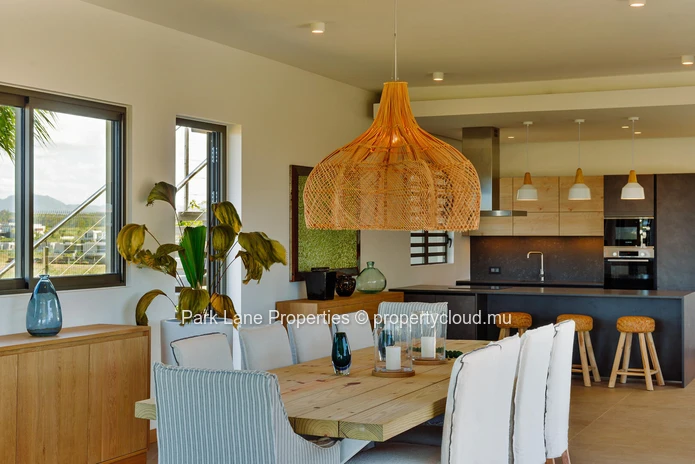 Bohemian Villa with Lagoon & Mountain Views for sale at Beau Champ.