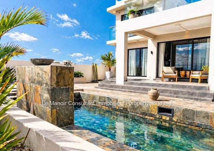 Villa moderne de 4 chambres en suite avec piscine privée- Morcellement sécurisé.