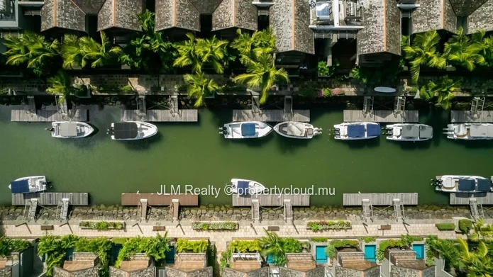 For sale, lovely waterfront duplex in the only residential marina of Mauritius, in Black River