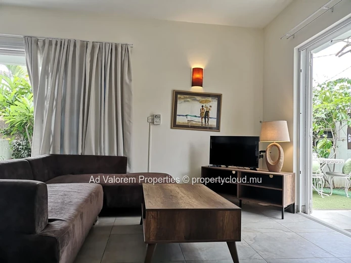 Appartement à vendre à Rivière Noire, 97m², 2 chambres, 2 salles de bain, jardin, parking, proximité commerces, école...