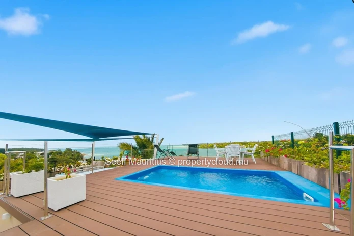Beachfront Penthouse with Private Rooftop Pool 