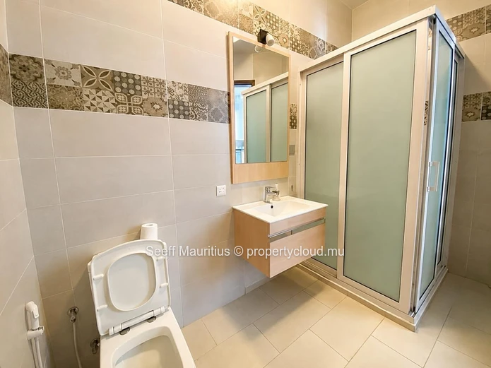 This splendid duplex features three bedrooms and three bathrooms