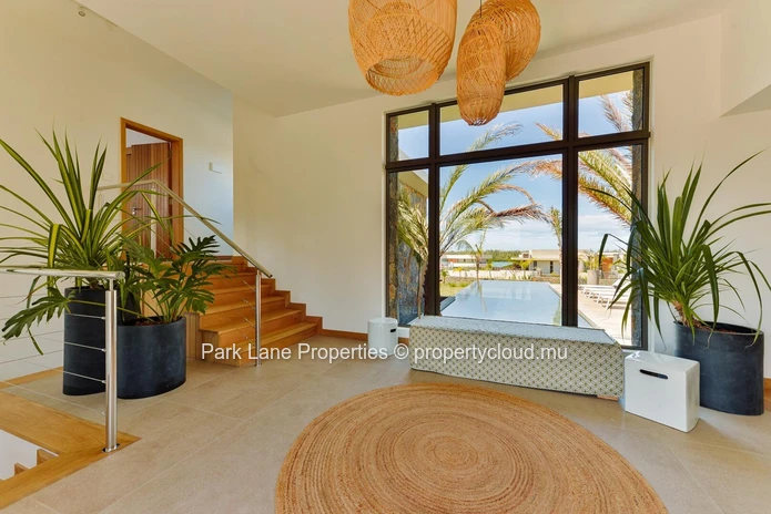 Bohemian Villa with Lagoon & Mountain Views for sale at Beau Champ.