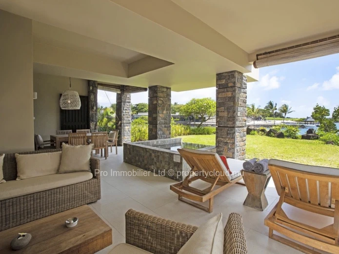 Ground-floor apartment with stunning sea views at the prestigious Anahita Golf Resort in Beau Champ.