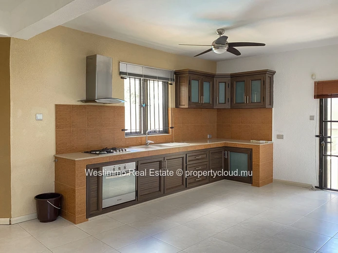 Long-term rental: Furnished studio with terrace and sea view for rent in Grand Gaube, Mauritius.