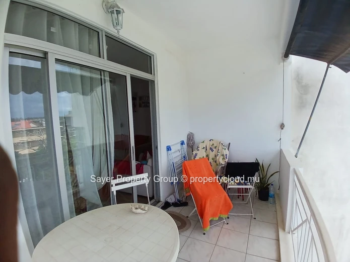 Rare Opportunity: Spacious Top Floor Apartment with Ocean Views