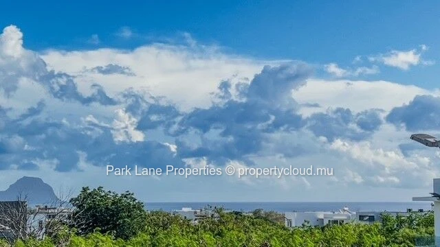 Appartement élégant dans une résidence neuve avec piscine et vue sur les montagnes à Flic en Flac