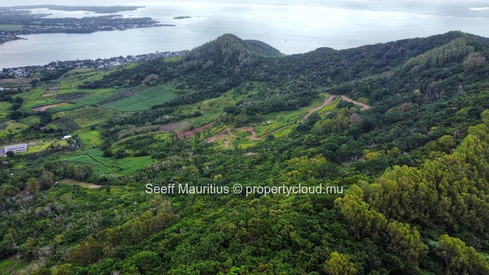 Summit Serenity: Prime Mountain Land with Panoramic Sea Views