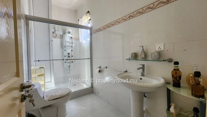 Modern ground floor apartment in Rose Hill with 3 bedrooms 3 bathrooms veranda and secured parking near schools and s...