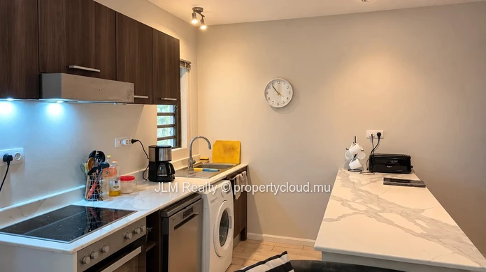 For Sale in Tamarin, Mauritius: 2-Bedroom Apartment Just Steps from the Beach with Access to a Communal Pool