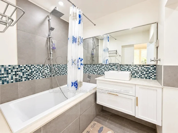 Appartement d’une chambre avec piscine privative et balcon-terrasse à Bain-Bœuf