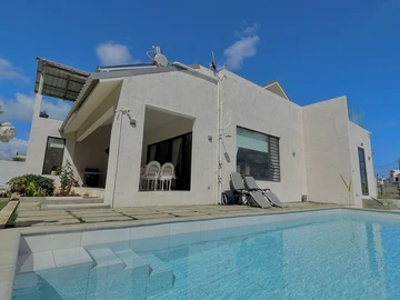 3-Bedroom House with Open Spaces, Garden, and Pool located in a secure gated estate