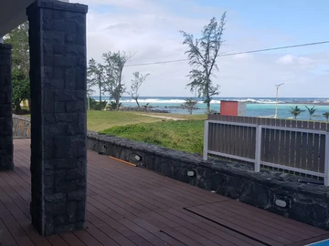 Waterfront villa for sale on land of 12 perches in full ownership with sea view in the South at Le Bouchon.