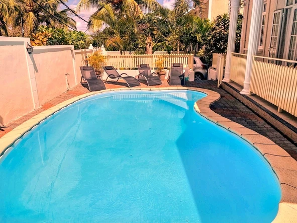 La Gaulette for sale villa divided into 4 two-bedroom apartments with commun swimming pool in a quiet residential area.