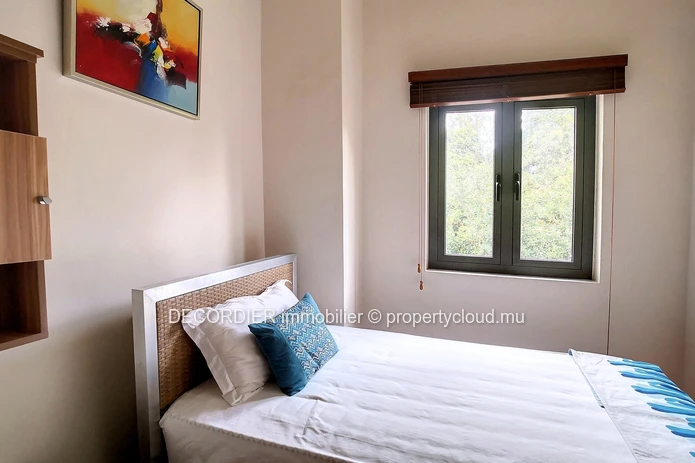 Duplex in residence with communal swimming pool