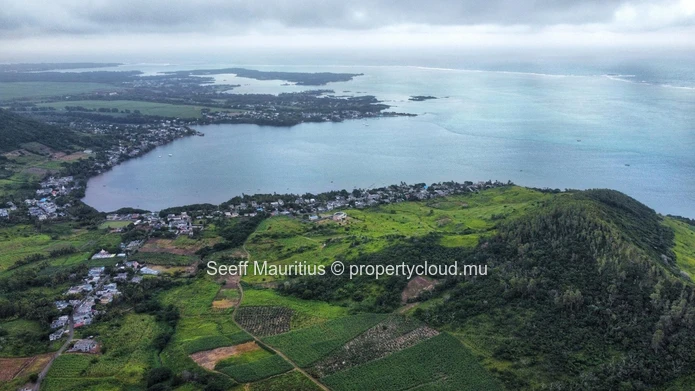 Summit Serenity: Prime Mountain Land with Panoramic Sea Views