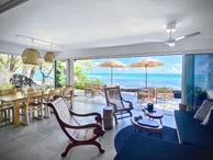 Stunning beachfront villa for rent at Roches Noires,  Fully furnished with elegance and style. 