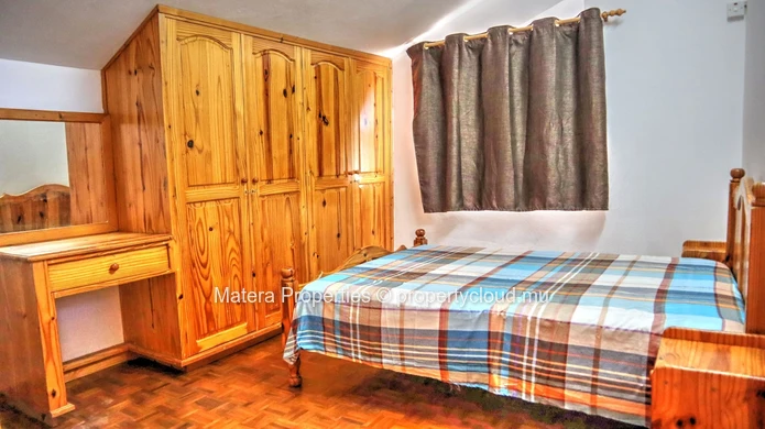À 1 minute à pied de la plage de Flic en Flac - appartement de 2 chambres - idéal pour un investissement immobilier.