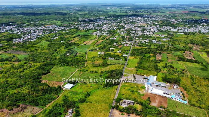 Golden Opportunity: Large Plot with Stunning Mountain and Sea Views, on the main road.