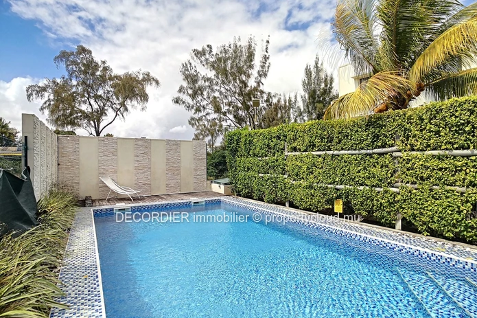 Duplex in residence with communal swimming pool
