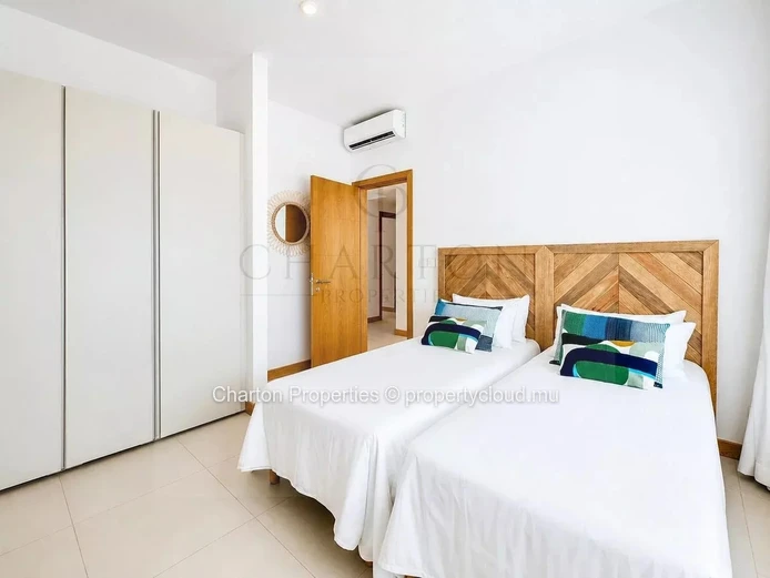 Elegant 3-bedroom apartment with en-suite bathrooms, a terrace, and exclusive amenities in Grand Gaube