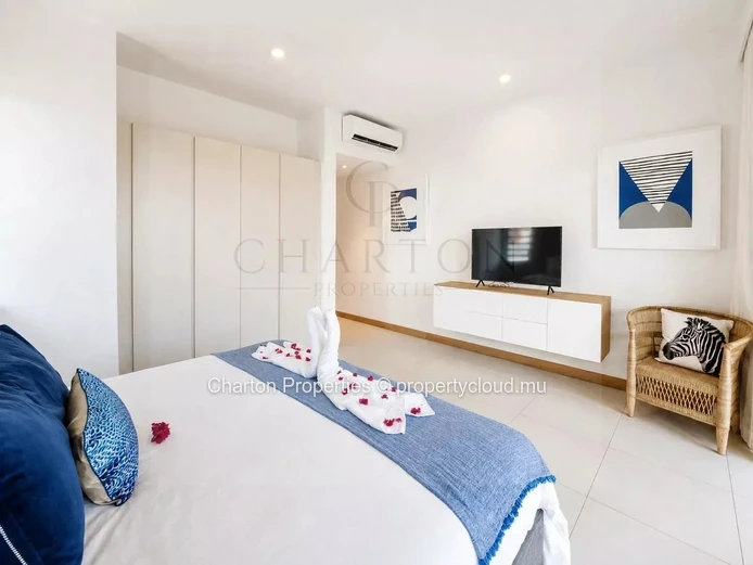 Elegant 3-bedroom apartment with en-suite bathrooms, a terrace, and exclusive amenities in Grand Gaube
