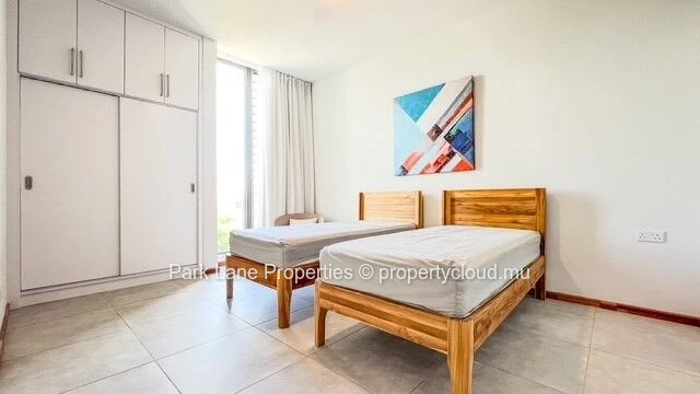 Appartement élégant dans une résidence neuve avec piscine et vue sur les montagnes à Flic en Flac